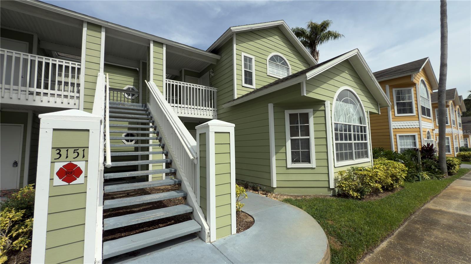 Welcome to this rare and spacious 3-bedroom, 3-bathroom condo located on the second floor in a highly sought-after resort-style community just 10 minutes from Disney! This unique unit features "two master suites with private bathrooms", an open-concept living, dining, and kitchen area, and a private balcony perfect for relaxing or entertaining. This is the ONLY active listing with 3 bedrooms and 3 full bathrooms at this price point, making it an exceptional opportunity for investors, second-home buyers, or primary residents. The community offers resort-style amenities including a sparkling swimming pool, tennis courts, a fitness center, and more. Enjoy being just minutes away from a variety of restaurants, shops, and world-famous attractions. Don’t miss out on this unmatched combination of space, value, and location!