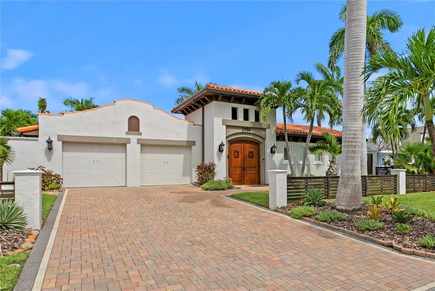 Waterfront Living on Vina Del Mar Island
Experience the best of coastal living on Pass-A-Grille Back Channel with breathtaking views of the iconic Don CeSar. This Mediterranean-inspired home includes a private casita with full bath and separate entrance off the courtyard pool—ideal for guests, extended family, or a private office retreat. Some of the attributes include a fully appointed dock with boat lift, impact-rated windows and doors, and classic clay tile roof ensure both function and style. Inside, a chef’s kitchen with island seating anchors the home, perfect for both casual mornings and lively gatherings. The spacious dining room sets the stage for memorable dinner parties, while the living room—with fabulous fireplace and water views—flows seamlessly to the waterfront patio.
The primary suite offers private water views and patio access, with a spa-inspired bath featuring dual vanities, glass shower, garden tub, separate water closet, and two walk-in closets. A guest room with sliding doors opens directly to the pool area.
Outdoors, a resort-style courtyard awaits with pool, hot tub, summer kitchen, and lush landscaping—perfect for entertaining or quiet relaxation. A split two-car garage completes this well-appointed home.
Enjoy an unparalleled lifestyle on desirable Vina Del Mar Island, just minutes from the white sandy beaches, charming Pass-A-Grille, and vibrant downtown St. Petersburg.