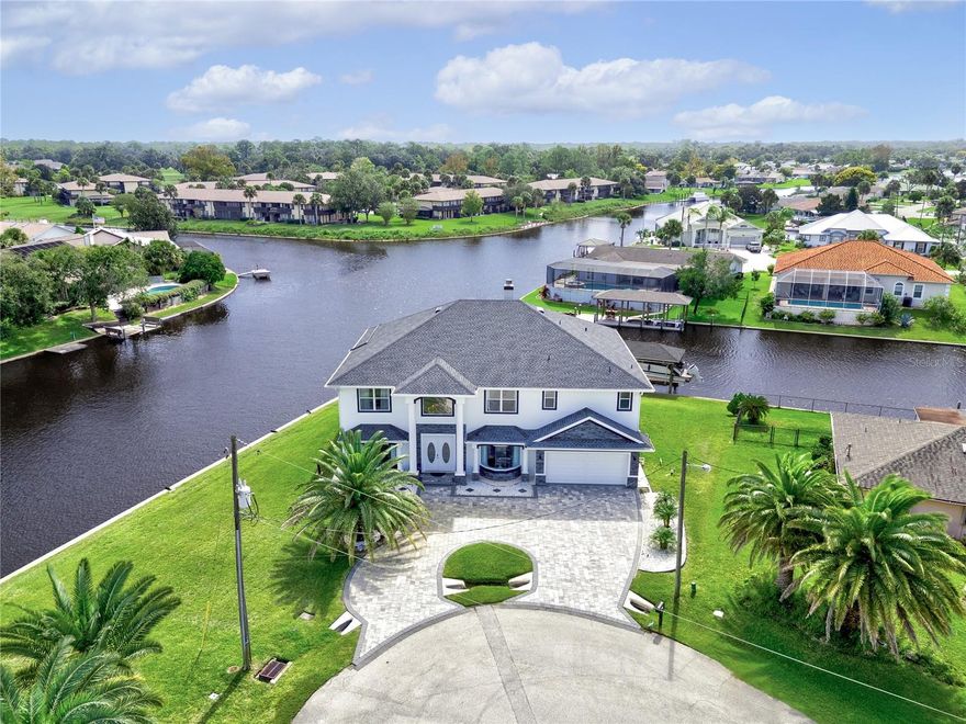 Welcome to a rare waterfront masterpiece at 16 Florence Ct, perfectly positioned on an expansive tip lot offering approximately 248 feet of saltwater canal frontage with quick access to the Intracoastal Waterway in just minutes.
This exceptional coastal retreat spans over 4,000 square feet and features 6 spacious bedrooms and 4.5 bathrooms, thoughtfully designed to capture breathtaking water views from nearly every room. From the moment you enter, you are greeted with light-filled living spaces and panoramic waterfront scenery that defines true Florida luxury living.
Step outside to your private outdoor oasis, where a screened-in pool and lanai create the perfect setting for both relaxation and entertaining. Enjoy peaceful mornings watching dolphins glide through the canal, and unwind in the evenings with stunning sunset reflections over the water from the expansive second-floor balcony.
Boating enthusiasts will appreciate the multiple boat basins and private dock, along with a 6,000 lb boat lift, making this a dream location for those seeking effortless access to the Intracoastal.
Recent upgrades provide peace of mind and modern comfort, including:
New roof
New HVAC system
New water heater
New dishwasher
New pool pump
New circular paver driveway
New Beautiful Porcelain Flooring on the first floor
New security system with cameras Adding even more value, high-end furnishings are negotiable, and a 25-foot boat (accommodating up to 14 passengers) may also be included, offering a true turnkey waterfront lifestyle.
Whether you’re searching for a full-time residence, a luxurious vacation home, or a high-performing investment opportunity, this property offers an unmatched combination of location, space, and lifestyle.
This is more than a home—it’s a waterfront experience. Opportunities like this are truly rare.