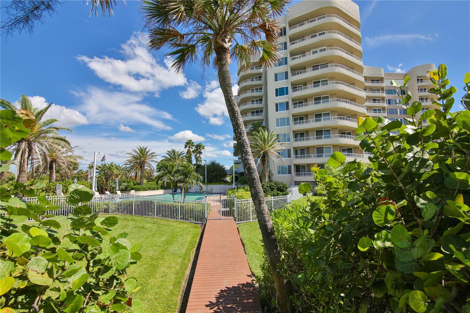 AVAILABLE 2025 SEASON. Enjoy beautiful sunsets or sunrises from this spacious 4th floor condo with partial gulf and bay views. This 1600 sq. ft. two bedroom two bath condo is located directly on the sugary beach of Longboat Key with lounge chairs and umbrellas provided. Wrap around balcony with partial Gulf of Mexico and Longboat Key Club golf views. Washer/dryer in the unit, pool, fitness center and tennis courts plus. 24 hr. Concierge and garage parking. Recently painted, new flooring in bedrooms and kitchen. Short distance to St. Armands circle with upscale shopping and restaurants or drive to downtown and enjoy symphony, opera, ballet, live theater and a variety of restaurants to suit most palates.