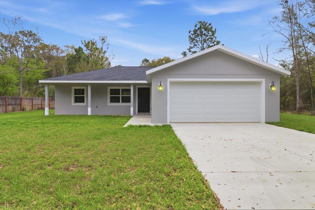Photo of 8593 N Fauci Point, Crystal River, FL 34428 (MLS # OM722426)
