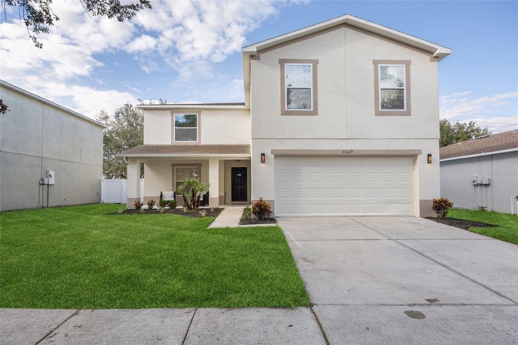 Photo of 31029 Temple Stand Avenue, Wesley Chapel, FL 33543 (MLS # TB8433298)