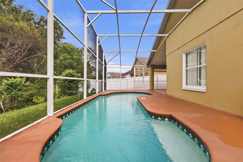 Photo of 2452 Winchester Boulevard, Kissimmee, FL 34743 (MLS # O6452127)