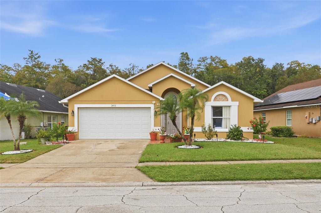 Photo of 2452 Winchester Boulevard, Kissimmee, FL 34743 (MLS # O6452127)