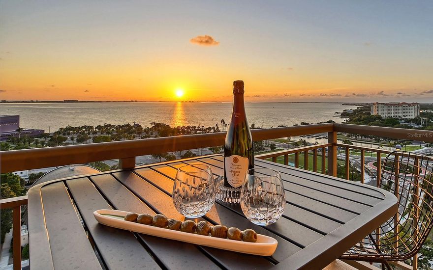 Under contract-accepting backup offers. Downtown Sarasota 15th floor residence with high and wide water views and excellent location in the Rosemary District. Near downtown shopping, dining, waterfront parks and entertainment options, and just a quick drive over the iconic John Ringling Causeway to Lido Beach. This nearly 2,000-square-foot condominium lives large with a spacious living area that includes a central kitchen surrounded by dining room, living room and family room. Two private bedrooms offer peaceful retreats any time of day. An additional bonus room can be used as a home office or hobby room. Oversize windows and high ceilings showcase the breathtaking views of Sarasota Bay. Upgrades in 2023 include new wood-look porcelain tile flooring throughout, new trim and new paint, plus remodeled kitchen and baths. Luxury features include whole-house Halo water filtration, Legrand lighting control system, automated sunshades, covered wrap-around balcony, in-unit laundry room with full-size washer and dryer, and three deeded parking spaces. Alinari is a well-run condominium with an active social committee. Resort-style amenities include concierge service, heated pool and spa with sun deck and cabanas, state-of-the-art fitness center, sauna, theater room, social room, billiards room, business center, indoor bicycle storage and guest suite for visitors. Wine lovers can gather in the climate-controlled wine room with storage lockers. The great location is getting better with development of The Quay Sarasota and The Bay, 53 acres of waterfront land along Sarasota Bay being developed into a signature public park. Get an immersive experience of this residence by looking at all photos, video and 3D tour.