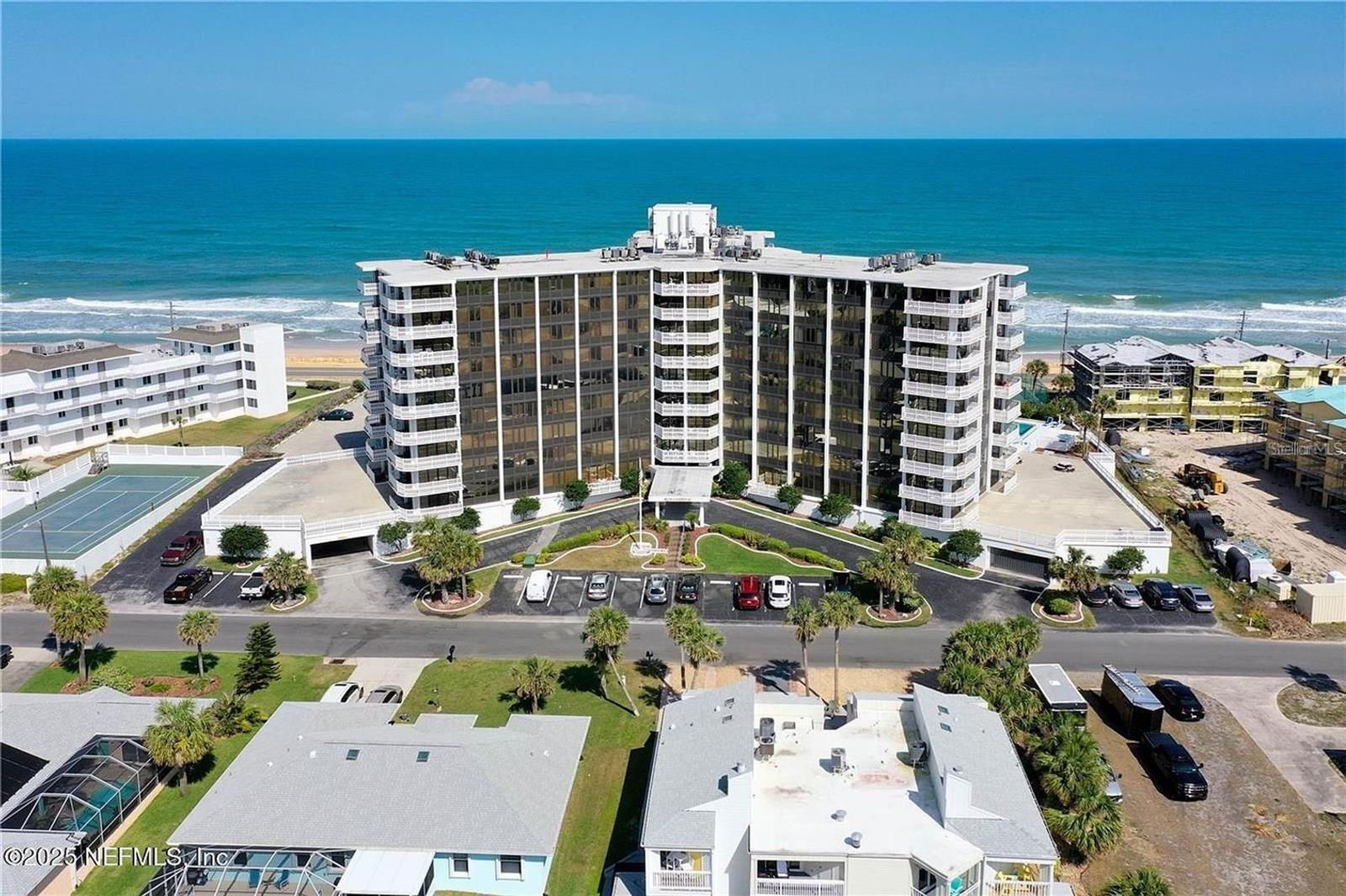 LIFE'S A BEACH- FULLY FURNISHED at the Nautilus 3bd 2bath!
"LIFE'S A BEACH" FULLY FURNISHED at the "Nautilus" in FLAGLER BEACH. Sparkling Ocean Views From Every Room of this 4th floor unit! IMMACULATE, COMPLETELY REMASTERED with HURRICANE SHUTTERS. Almost 1,500 Square Feet of Serene Tranquility! 3 Good Size Bedrooms, each with Walk-In Closets. 2 Full Bathrooms, Completely Remodeled, One with Walk-In Shower & One with Large Jacuzzi Tub. The Unit is Freshly Painted & has New Luxury Vinyl Plank Flooring. New A/C, plus Fans & Window Treatments in every room. Large Kitchen has been updated with Granite Countertops & Wood Cabinets, as well as Newer SS Appliances. Expansive Covered Balconies of the Living Room & Master Suite to Enjoy the Morning Ocean Sunrises & the Shady Afternoon Ocean Breezes. Large 2nd Bedroom (with 2 entrances) Doubles as a Flex Room or Double Doors Open To Expand The Living Room! Huge Built-In Wall Unit in the Hallway provides Extra Storage or Your Own Personal Library! Secured Building for Your Safety, as well as Secured Underground Parking with One Deeded Space.