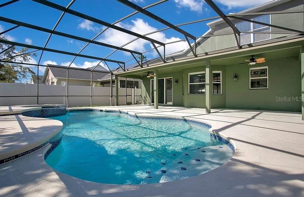 Photo of 14149 Lake Live Oak Drive, Orlando, FL 32828 (MLS # O6392657)