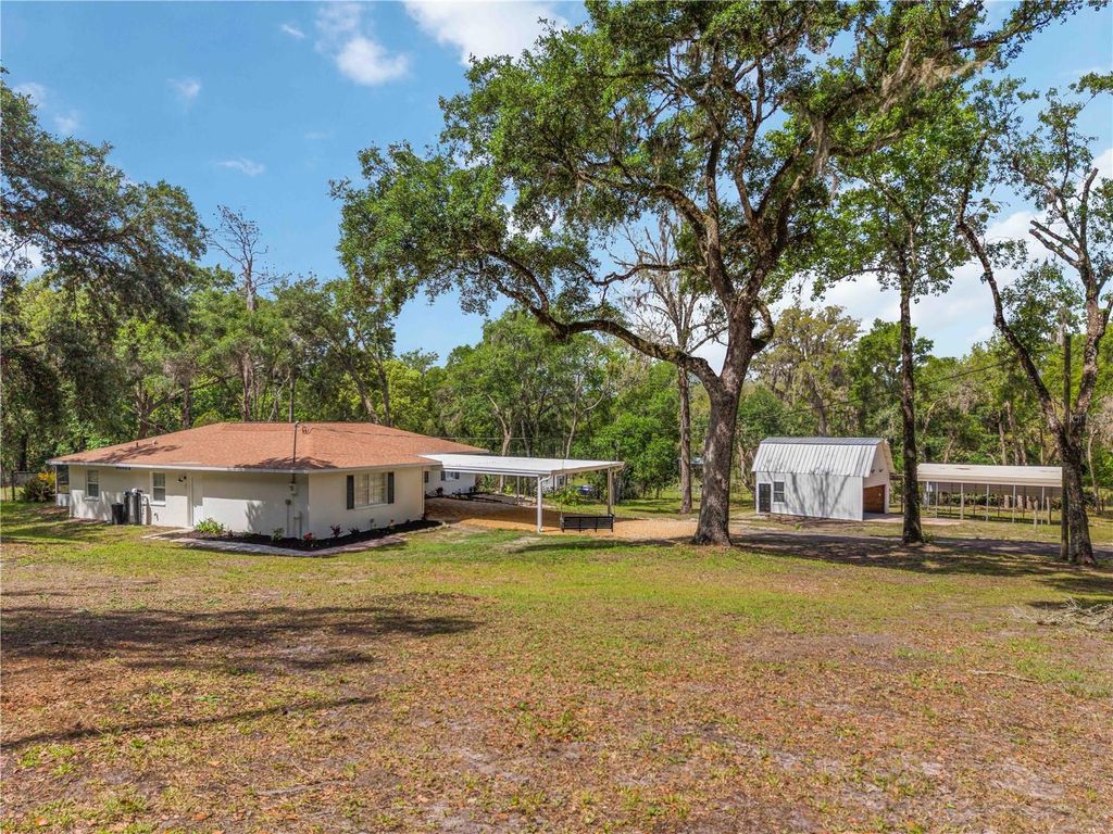 Photo of 2293 Spring Lake Highway, Brooksville, FL 34602 (MLS # A4688353)