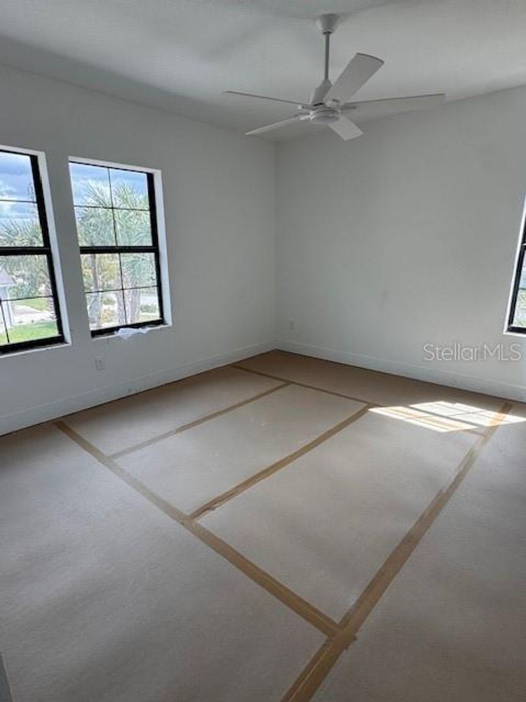 Photo of 2936 W Rogers Avenue, Tampa, FL 33611 (MLS # TB8463818)