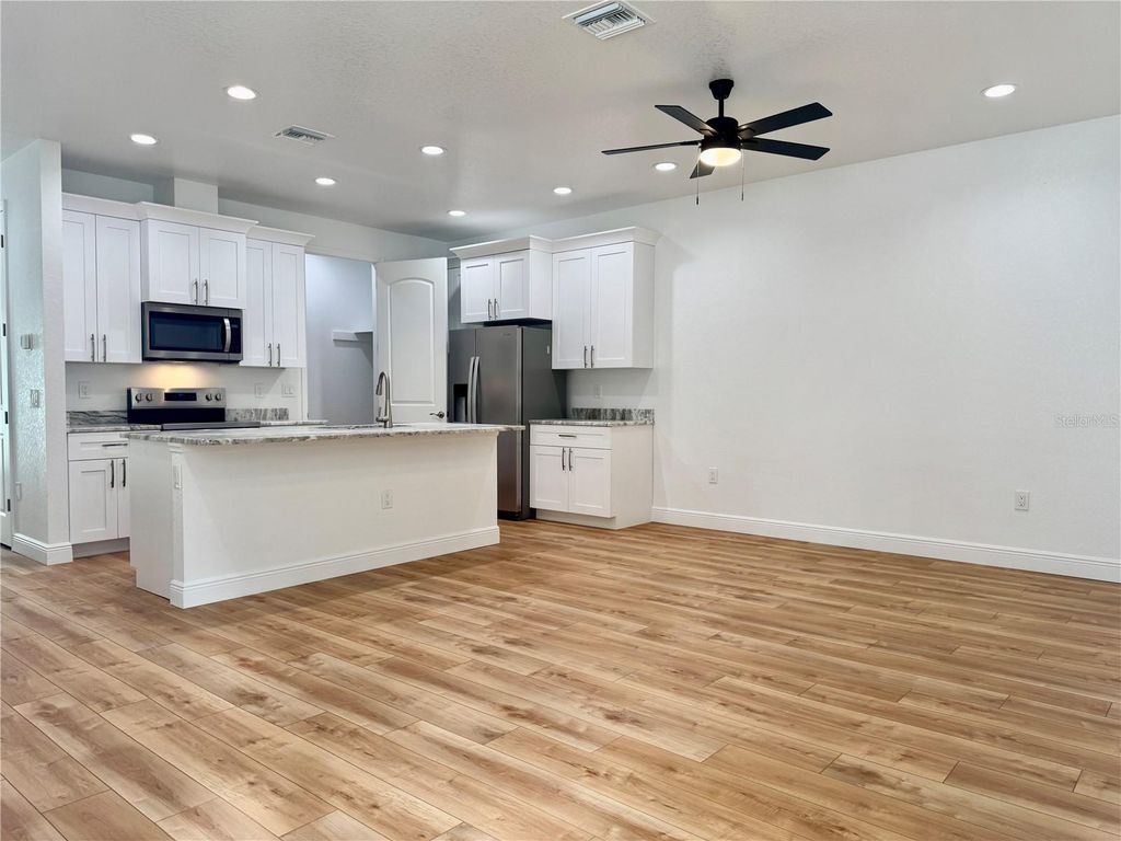 Photo of 704 13th Avenue NW, Largo, FL 33770 (MLS # TB8452410)