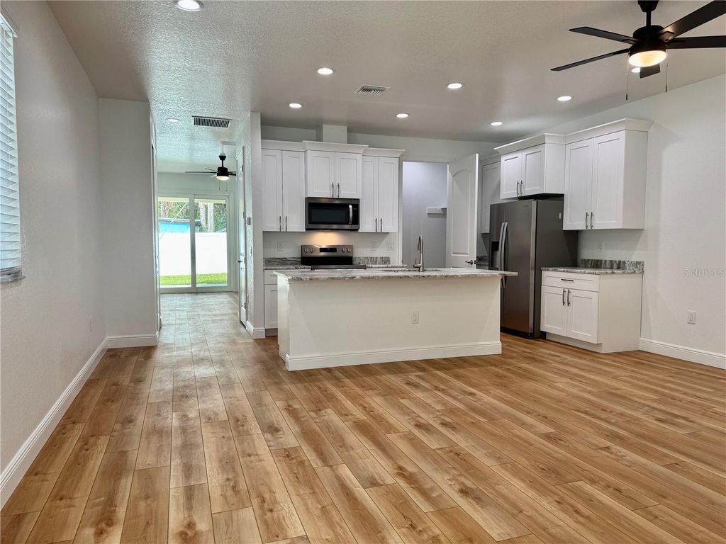 Photo of 704 13th Avenue NW, Largo, FL 33770 (MLS # TB8452410)