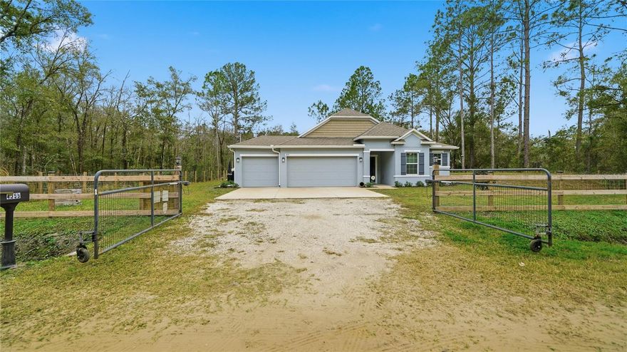 Built in 2024 and truly better than new, this upgraded concrete block 3-bedroom, 2-bath home with a flex room sits on a spacious 1.14-acre lot in Hastings, offering the privacy and freedom of rural living with modern comforts throughout. With tile flooring throughout the entire home, elevated window trim, and a thoughtfully designed layout, this home is both stylish and low-maintenance. A 3-car garage provides ample space for vehicles, tools, or recreational gear.

Designed for those who value space and lifestyle, the property features ¼ acre fully fenced, an electric driveway gate, and room to spread out—ideal for outdoor entertaining, hobbies, or enjoying quiet country evenings. The backyard includes a 12’ x 12’ sandbox firepit area, perfect for gatherings under the stars. Additional upgrades include 6” whole-house gutters, a water softener and carbon filtration system, and a security system with cameras. Major systems come with active warranties, offering peace of mind. With no need to wait on construction and upgrades already in place, this home stands apart as a move-in-ready property with space, privacy, and thoughtful upgrades throughout.

All information pertaining to the property is deemed reliable, but not guaranteed. Information to be verified by the Buyer. Be advised that cameras may exist recording audio and video inside/outside the property, such as ring doorbells. Photos are digitally enhanced and could be altered, please verify.