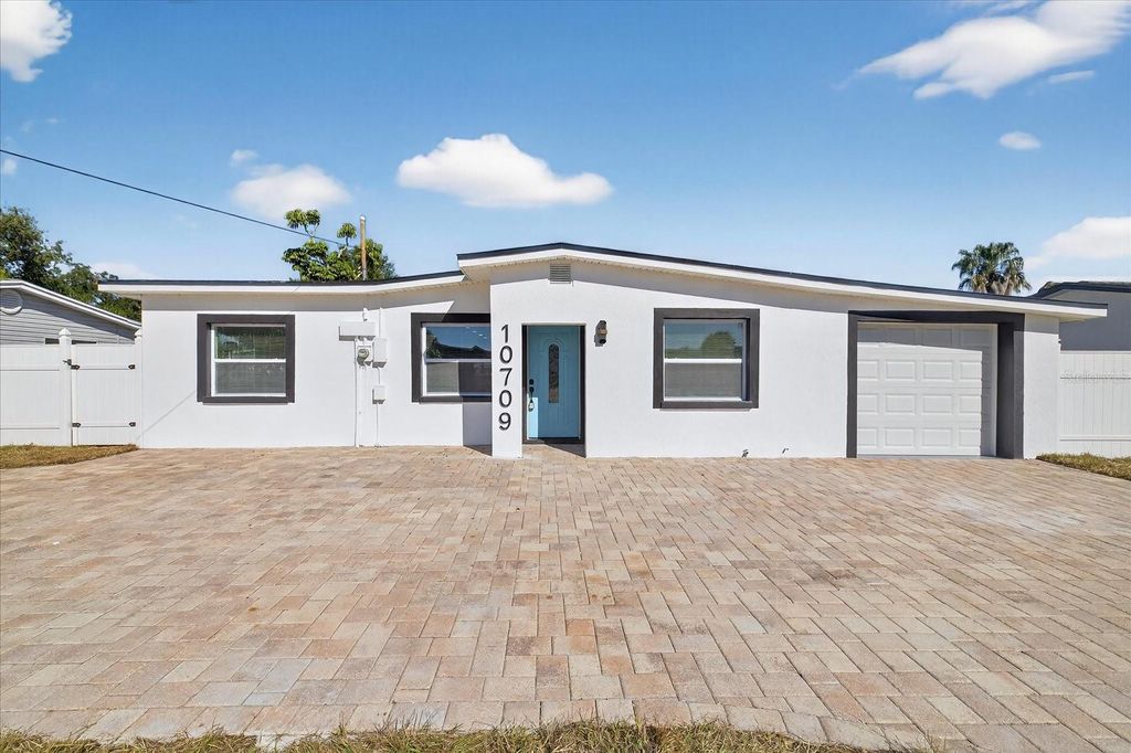 Photo of 10709 Dowry Avenue, Tampa, FL 33615 (MLS # TB8457751)