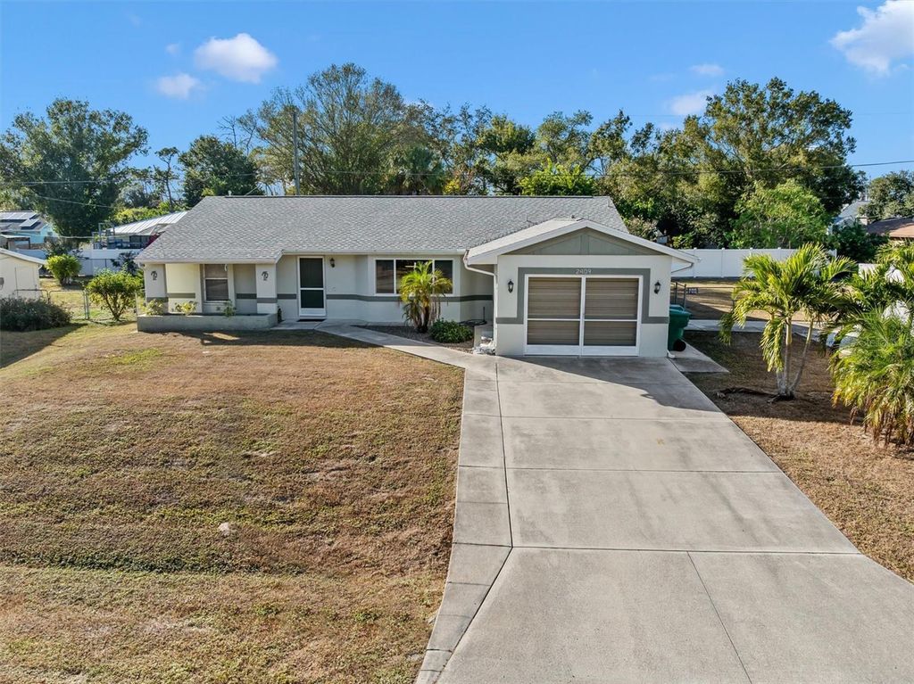 Photo of 2409 Dando Street, Port Charlotte, FL 33948 (MLS # C7518303)