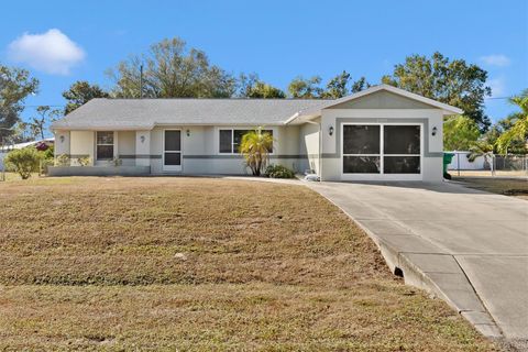 Photo of 2409 Dando Street, Port Charlotte, FL 33948 (MLS # C7518303)