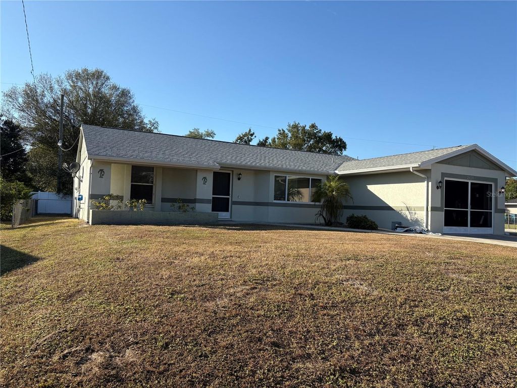Photo of 2409 Dando Street, Port Charlotte, FL 33948 (MLS # C7518303)