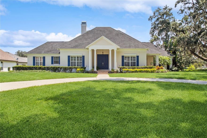 Under contract-accepting backup offers. Welcome to Park Place on Lake Joanna, where this charming home awaits your personal touch. Situated in a sought-after neighborhood, this property offers the perfect canvas for your dream home. This home was built as the personal residence for the developer’s son and includes a number of upgrades including 12-foot-high ceilings, dental crown molding, French doors to the lanai, and plantation shutters throughout.
There is a circular driveway and canopy of live oak trees in front providing stately curb appeal.  Step inside and envision the transformation that can take place. The spacious living area boasts abundant natural light, creating a warm and inviting atmosphere. The open floor plan seamlessly connects the living room, dining area, and kitchen, allowing for effortless entertaining and comfortable daily living.
The kitchen presents an opportunity to design a culinary haven tailored to your tastes. With its generous layout and ample storage space, you can reimagine this space into a chef's dream.  French doors from the kitchen lead to a side porch and access to the lush tropical landscaping.  The oversized two-car garage and laundry room with built-in cabinets are also accessible from the kitchen.
This home features three bedrooms and two-and-a-half bathrooms, providing ample accommodation for your family or guests. From the large, covered lanai off the family room, you can step outside into the backyard where you'll find a private oasis. The outdoor space offers endless possibilities for gardening, outdoor entertaining, or even the addition of a pool or patio area. It's the perfect place to create an outdoor sanctuary that reflects your lifestyle and preferences.
Lake Joanna, a 335-acre spring-fed lake, is located directly across the street and offers some of the most beautiful sunsets in the area.  Access to the lake is available just a few blocks away where you will find a boat ramp and dock available to residents of Park Place.  Other amenities in the neighborhood include a fenced playground.
Conveniently located in Park Place with easy access to downtown Mt. Dora and Eustis.  You can enjoy the small-town charm these towns offer while still being within easy reach of Orlando and Sanford via the new 429 interchange.
If you're seeking a home with the potential to be transformed into your ideal haven, this property in Park Place Subdivision is your opportunity. Embrace the chance to make this house your own, and let your imagination and creativity take flight.

The listing agent has partial ownership in the property.