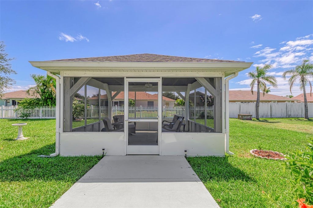 Photo of 6261 Coliseum Boulevard, Port Charlotte, FL 33981 (MLS # C7530900)