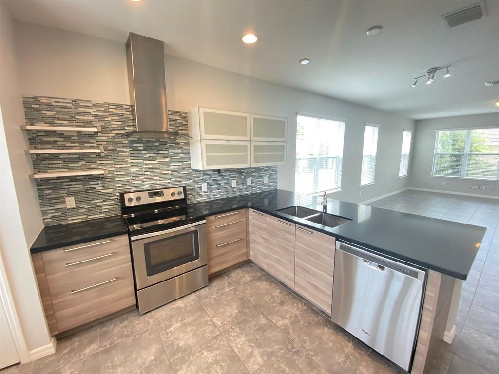 Photo of 7255 Shadeview Alley, Windermere, FL 34786 (MLS # O6395878)