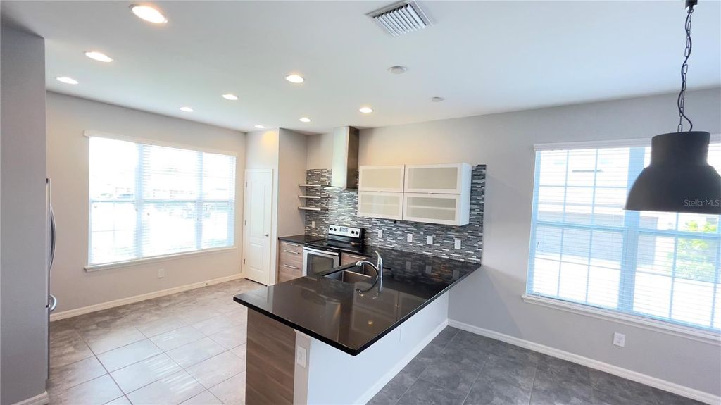 Photo of 7255 Shadeview Alley, Windermere, FL 34786 (MLS # O6395878)