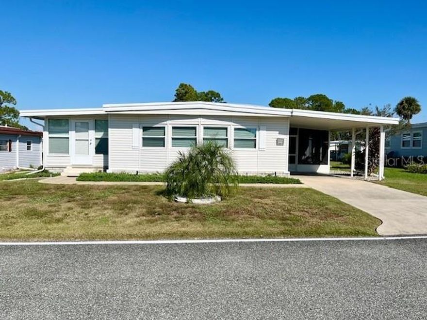 Welcome to this beautifully maintained 1,152 sq ft residence offering comfort, style, and convenience in a peaceful neighborhood. This 2-bedroom, 2-bathroom home features a remodeled kitchen (2012) perfect for cooking and entertaining. Enjoy the natural light streaming through new windows, and stay cool year-round with a replaced A/C unit (2013). The home is partially furnished, including a cozy living room setup, a dining area with built-in cabinetry, and tasteful décor throughout. Outside, the property boasts a covered carport, manicured lawn, and inviting curb appeal. Whether you're a seasonal resident or looking for a full-time retreat, this home offers a perfect blend of comfort and functionality. Hawthorne at Leesburg is an active, resident owned, 55+ cooperative, waterfront, gated community, with beautifully landscaped grounds, lakes with illuminated fountains and a relaxing and comfortable gazebo. The affordable monthly maintenance fee of $346 includes water, sewer, lawn mowing, private emergency services and storage space for recreational vehicles, boats, trailers and much more! The beautiful clubhouse is complete with a full-time program coordinator, more than 100 different activities and seating for 550. It has a hospitality lounge, card rooms, craft rooms, billiard room, fitness center, library, fine arts room and many more. There is excellent fishing, outdoor geo-thermally heated pool and two enclosed therapeutic pools. Hawthorne boasts a private marina monitored by an electronic security system with over 120 boat slips and access to the Harris Chain of Lakes and beyond.