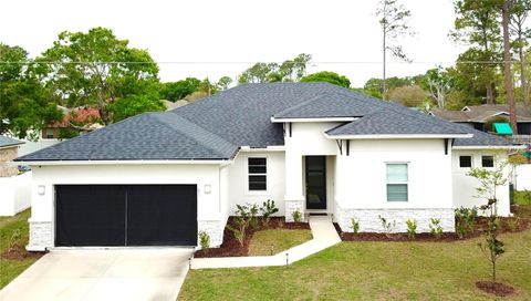 Photo of 61 Beauford Lane, Palm Coast, FL 32137 (MLS # O6397567)