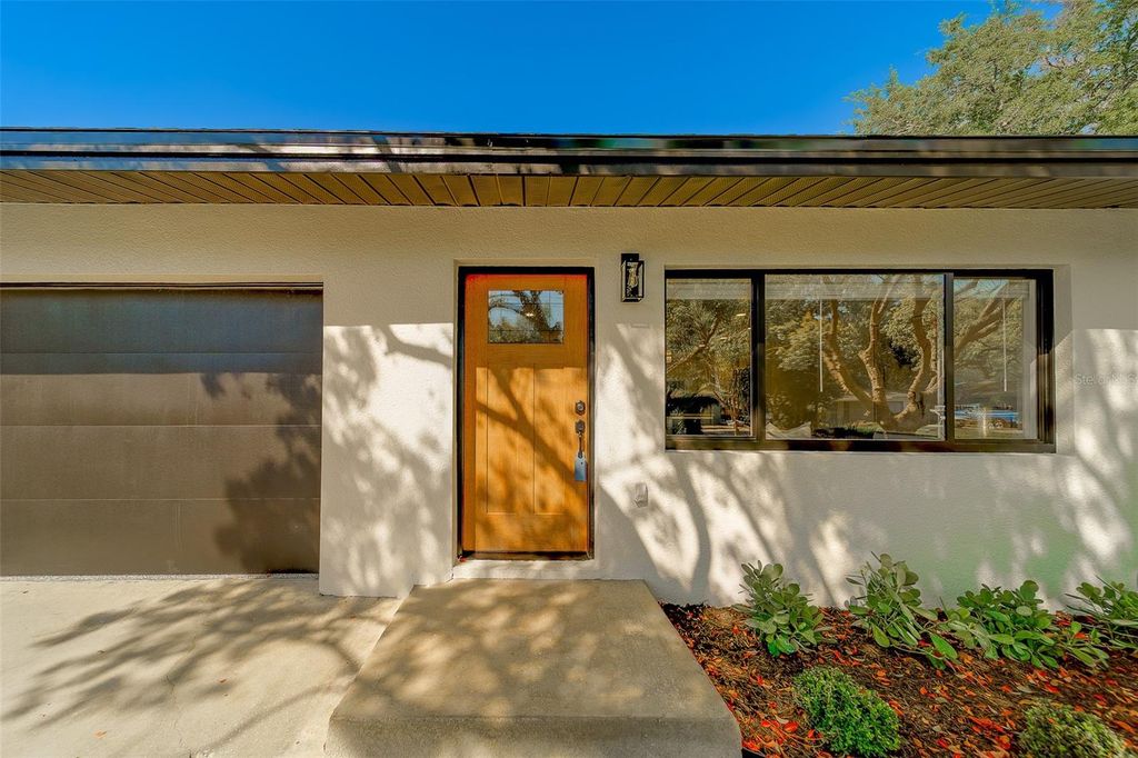 Photo of 1274 Robin Hood Lane, Dunedin, FL 34698 (MLS # TB8491431)