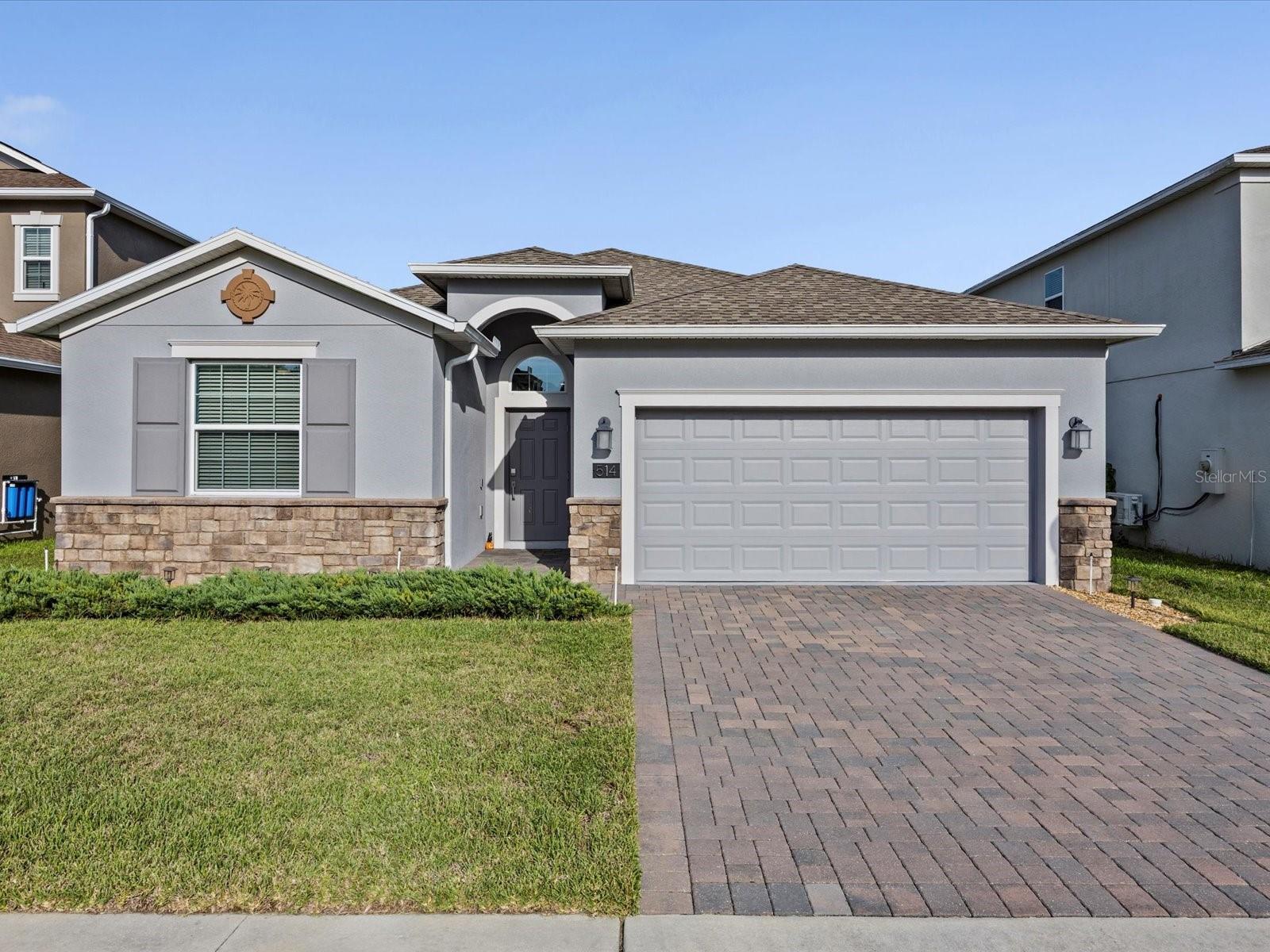 THIS IS THE PROVIDENCE POOL HOME YOU'VE BEEN LOOKING FOR! Inside this guard-gated community with tons of amenities, you'll find a spacious 4BR home with a stunning 15'x28' salt-water pool to enjoy the Florida lifestyle! Entering through the 12' foyer and nice wide hallway, the well-planned design makes this smart home feel much larger. Also, this smoke-free & pet-free home has been meticulously maintained and tastefully upgraded. With a Ruckus commercial router and loads of smart home features, working from home (or just enjoying touchless living) has never been easier! At the center of it all you'll find a great kitchen with walk-in pantry, stainless steel appliances, 42" solid-wood cabinets with crown molding, and anti-microbial quartz countertops, all overlooking the open living and dining areas. The triple sliding-glass doors lead to a huge screened lanai and expansive 40' paver pool deck. With the 4 bedrooms spread over 3 separate areas, everyone has their own private retreat, whether for home offices, or a growing family. All 3 bathrooms also have full-sized cabinets and quartz countertops.  There's so many reasons why the Hamilton was the best-selling floor plan year after year - (and this one even has its own mailbox!) When you're not at home, take advantage of the vast array of amenities the award-winning Providence Community has to offer: play 18 holes of Michael Dasher-designed Championship golf, join the tennis & pickleball leagues, swim in one of the heated pools, (Olympic-style and resort-style with slides), exercise in the state-of-the-art fitness center, or enjoy a meal in the clubhouse restaurant & bar. Also included are a dog park, playground, miles of walking and jogging trails, all behind 24-hour guarded gates, and just minutes from theme parks and all that Central Florida has to offer! With a LOW $143/mo. HOA and NO CDD FEES, it's no wonder Providence wins the Best Community Grand Award year after year! Make an appointment today to see this amazing home and community!