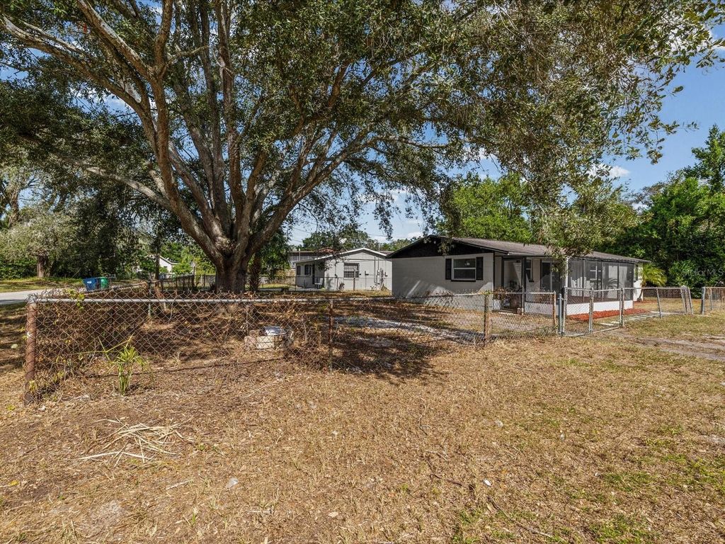 Photo of 9902 W Club Lane, Tampa, FL 33612 (MLS # TB8441422)