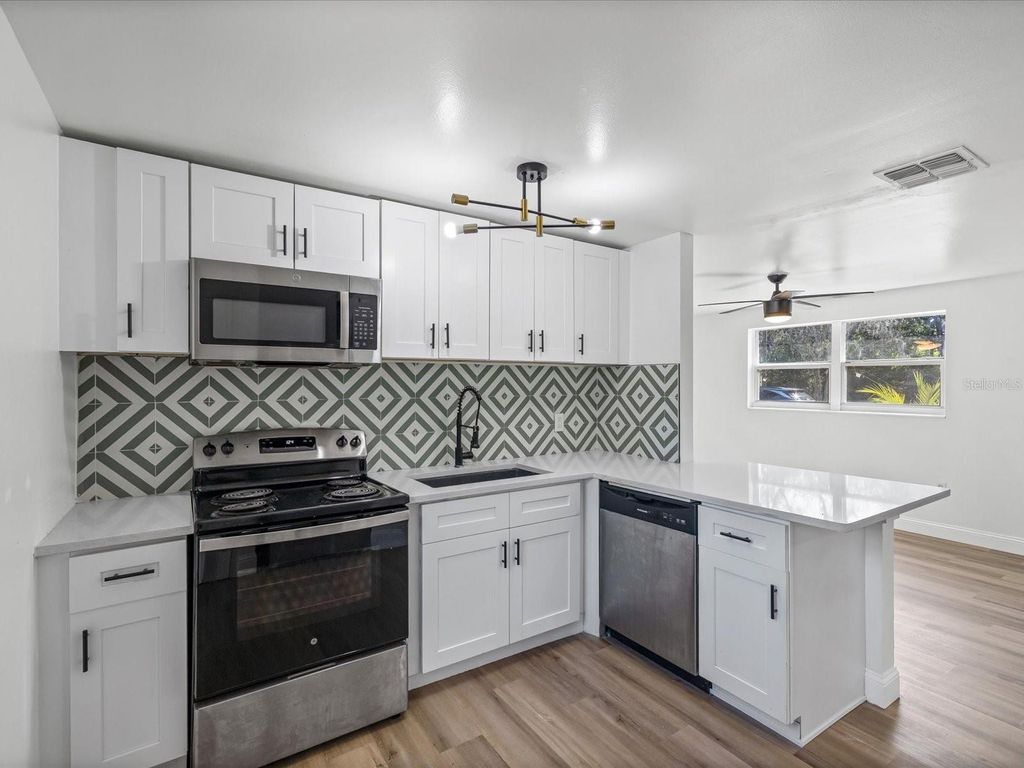 Photo of 9902 W Club Lane, Tampa, FL 33612 (MLS # TB8441422)