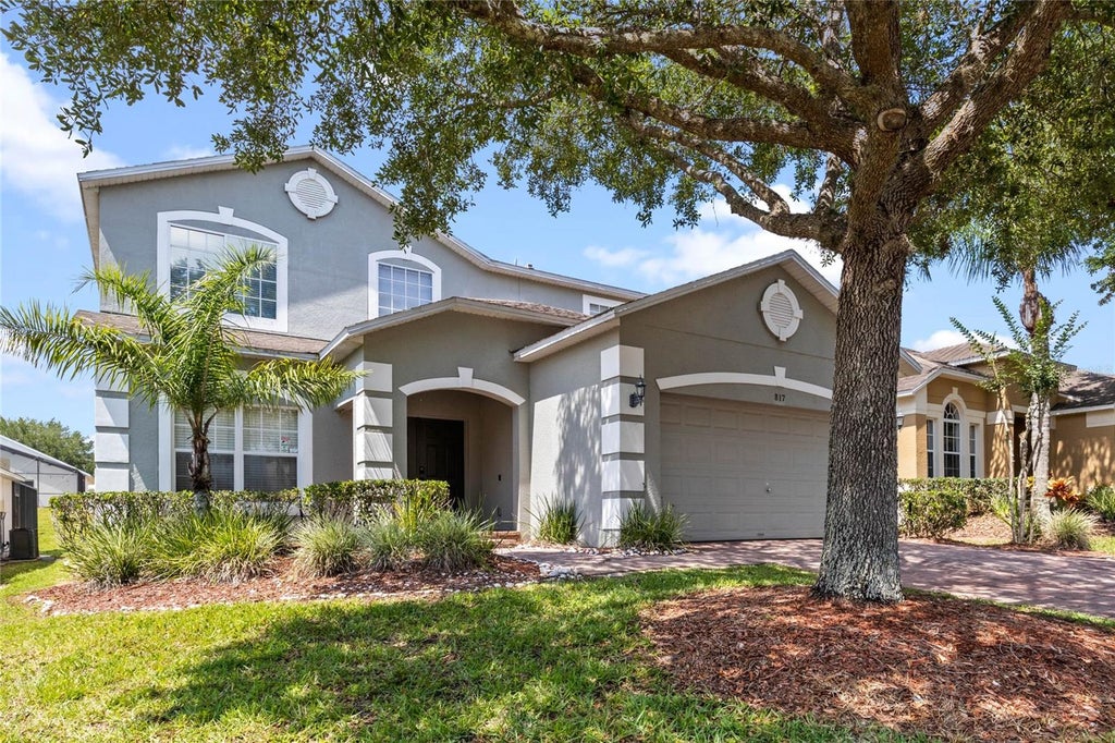 Photo of 817 Highgate Park Boulevard, Davenport, FL 33897 (MLS # O6446495)