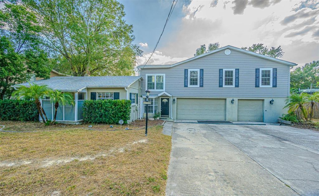 Photo of 12510 Forest Hills Drive, Tampa, FL 33612 (MLS # TB8449618)