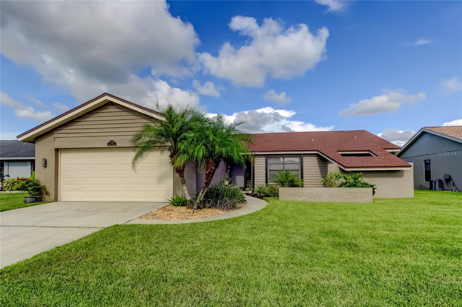 Welcome to your future home, located in the quiet, family oriented community of Fairway Springs connected to Longleaf. With top rated schools, safe atmosphere, and wonderful amenities! This beautifully well maintained three bedroom two bathroom property is move-in ready and offers the perfect blend of comfort, efficiency, and lifestyle. Has a bright open floor plan with plenty of natural light. Water views from your backyard. Fully updated kitchen, recently painted inside and out, updated guest bathroom, new water softener w/ carbon filtration, upgraded electrical panel and breakers, whole house filtration system on newer high efficiency a/c and much more. Community pool and amenities for the whole family to enjoy. Solar panels to offset high power bills with 22 year power guarantee w/fully transferable warranty. A mini split in the garage perfect for a workshop, gym or extra living space. This home provides not only comfort and convenience, but also the peace of mind of living in a welcoming community that prioritizes family living. Whether you’re enjoying the community pool, taking in the water view or simply relaxing in your spacious garage retreat this home truly has it all. Centrally located between Tampa and the beautiful Florida beaches. Don’t miss out and schedule your private tour today!