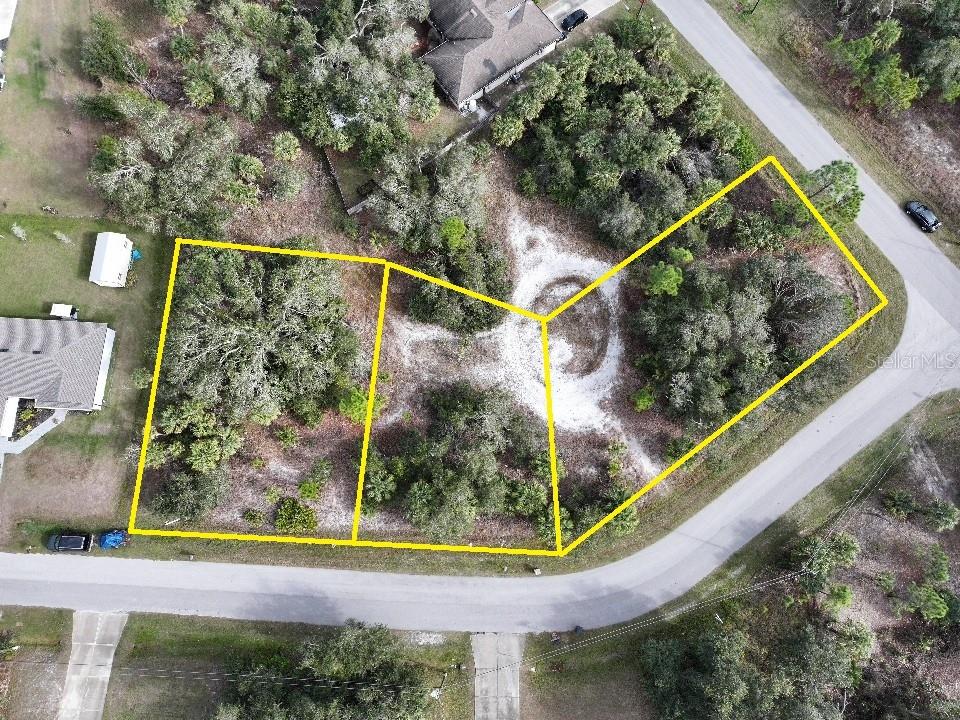 THREE LOTS!!! Here is your chance to own almost 32,000 square feet of land in North Port in a great residential neighborhood. Approximately ¾ of an acre, this triple lot is comprised of three individual lots so you can either buy this land to build one, two, even three homes, or simply purchase this great property to invest in the land in one of the nation’s fastest growing cities! One of these lots is on a corner giving this grand property more than 425 feet of road frontage!
Out of the more than 1,750 vacant lots for sale in North Port, less than 55 other lots are as big as this property, making owning land like this very rare! This property is also located about a mile and a half from I75 for great access to commute to larger cities such as Sarasota or Fort Myers. Lots of great shops, dining, and entertainment can be found within a 5-10 minute drive making this property one of the best choices on the market. Drive by to see this great property for yourself, and call your favorite real estate agent to make this property yours!