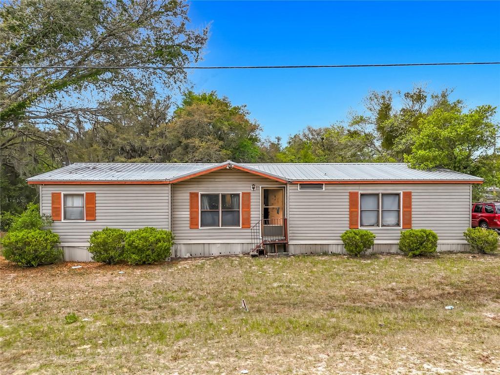 Photo of 201 Scott Street, Interlachen, FL 32148 (MLS # TB8506004)