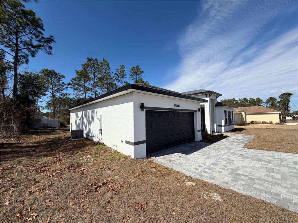 Photo of 13047 SW 79th Circle, Ocala, FL 34473 (MLS # O6382834)