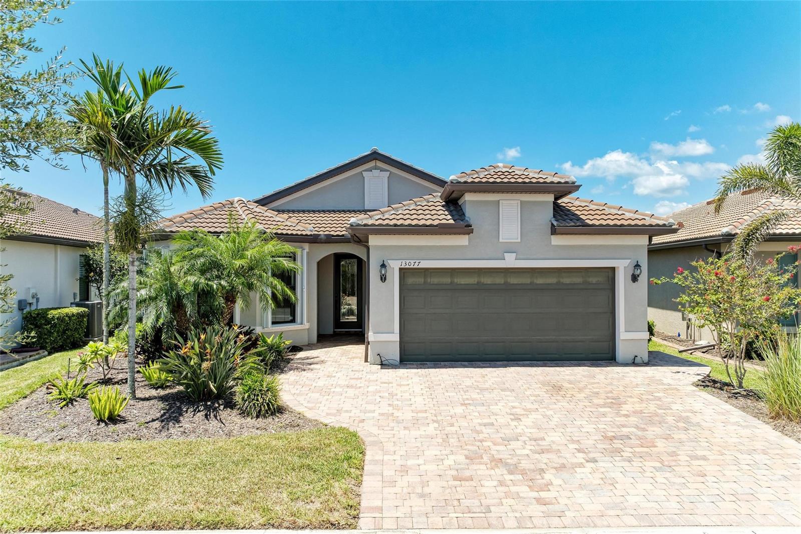 One or more photo(s) has been virtually staged. Don’t miss this stunning SUMMERWOOD model offering nearly 2,000 sq. ft. of thoughtfully designed living space with 4 bedrooms and 2 bathrooms. Built in 2019, this move-in ready SALTWATER HEATED POOL home is located in the highly sought-after IslandWalk at Wellen Park—a premier gated community with resort-style amenities. Enjoy serene lake views from your CLEARVIEW screened lanai with a sun shelf, water feature, umbrella feature, and shell-Crete deck. The extended covered area makes outdoor entertaining a breeze, rain or shine. This home offers peace of mind with ACCORDION SHUTTERS on all windows and STORM SMART protection on the lanai. The garage has hanging storage racks, is insulated and features a 4' EXTENSION—ideal for extra storage or a workshop. Interior highlights include CROWN MOLDING, UPGRADED LIGHTING, WOOD LIKE TILE FLOORING in main living areas and newer carpet in bedrooms, REVERSE OSMOSIS system in kitchen, and WHOLE-HOUSE WATER SOFTNER. The primary suite boasts dual vanities with quartz countertops, a walk-in shower, private water closet and a CUSOM BUILT-IN CLOSET for optimal organization. With three separate guest rooms, you'll have plenty of space for family and friends. One of the rooms features a thoughtfully designed built-in desk in place of a closet—perfect for a home office or study—but it can easily be converted back to a traditional closet if desired. The laundry room offers ample storage, adding to the home’s overall functionality. This gem won’t last—schedule your private showing today! IslandWalk is one of VENICE'S most social communities with a FULL TIME ACTIVITIES DIRECTOR, countless events and clubs and activities, TWO community clubhouses, an EVENT center, TWO resort style pools, a LAP pool, 12 PICKLE BALL Courts, 8 Har Tru Tennis Courts, DOG PARK, Playground, Basketball Court, Community Garden- the list goes on! The entire community is surrounded by miles and miles of golf cart trails, walking and biking trails, VENETIAN bridges and water! The Atlanta Braves Stadium is a short bike ride away- enjoy year- round events and activities. The new marketplace is now complete with PUBLIX, restaurants, shopping, gas station, etc! Downtown Wellen Park features an 80-acre lake, retail shops, restaurant waterfront dining and rooftop decks, pedestrian-friendly streets, a splash pad, a playground and a public town hall gathering place that hosts live theater and music events. Coming soon to downtown Wellen Park- a hammock grove and a permanent food truck area. IslandWalk HOA includes grounds maintenance, CABLE, WIFI, amenities, and 24-hour guard.