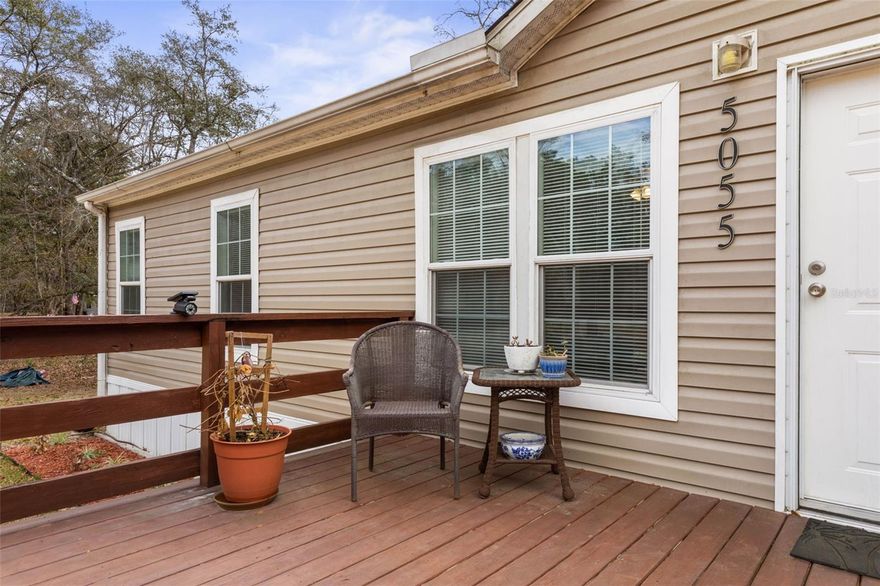 One or more photo(s) has been virtually staged. The floorplan you were not expecting—offering space, privacy, and the rural lifestyle many buyers are searching for near St. Augustine and Palm Coast. Virtually Staged 5 Bedrooms - 3 Full Baths - Built 2022 - Over 1 Acre - Two Living Areas - 18’ x 18’ Screened & Covered Back Patio - 10’ x 11’ Front Porch - Well Water with Softener, Full Filtration System & Water Purifier - Wired for External Generator - Security Lighting - Full Gutters - New Driveway - Recently Paved Road - 20 Fruit Trees - Raised Garden Beds - Treated Lumber Wood Patio - Two Sheds Including 12’ x 22’ Unit - Easy Access to Cracker Swamp Road

Looking for space, privacy, and true rural freedom in Flagler Estates? This modern 5-bedroom, 3-bath home built in 2022 sits on over an acre and offers the flexibility today’s buyers want with the open land lifestyle you’ve been searching for.
Inside, the layout features two separate living areas, making it ideal for multi-generational living, a home office, homeschool setup, media room, or guest quarters.   The design allows everyone to spread out while still feeling connected. Outside, enjoy peaceful Florida living with a large screened and covered back patio perfect for relaxing evenings and entertaining. The charming front porch welcomes you home, while the expansive acreage provides room for gardening, outdoor toys, animals (per zoning), or simply enjoying space between neighbors.

With well water, full filtration and purification systems, generator wiring, and security lighting, this property supports a more independent lifestyle while still offering modern comforts. The newly installed driveway and freshly paved county road make access smooth and convenient.

If you’ve been searching for a newer home on acreage in Flagler Estates that offers flexibility, functionality, and freedom, this property checks the boxes. Homesteader's dream or someone looking to raise chickens.  Gardener's delight

Buyer to verify all measurements, zoning, land use, and property details.