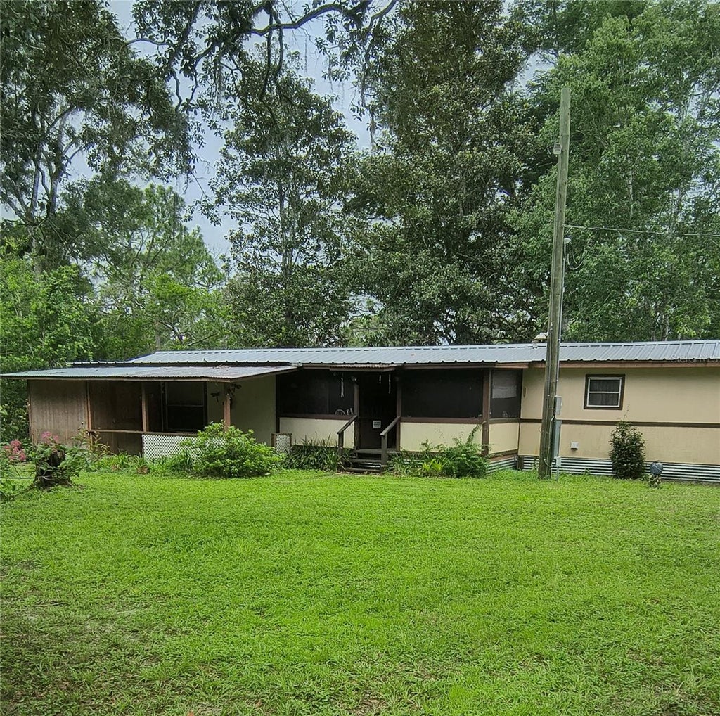 Photo of 18250 Caufield Road, Spring Hill, FL 34610 (MLS # W7889268)