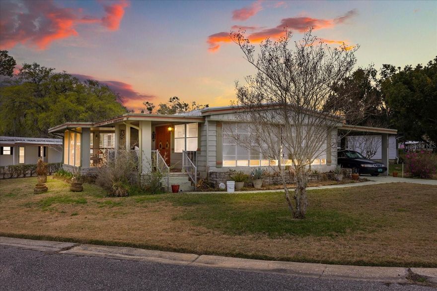 Grab your Towel and Sunscreen and WALK to the Heated Salt Water Pool or the Fitness Center or one of the many Community Buildings just a few short steps from your home. This 2 bedroom 2 bath home open floorplan is perfect for your next chapter in life. Newer AC 2020,  2000 Single Ply Membrane Roof with 2 great porches (one screened, one covered and open) Great Views and Cool Breezes. Zellwood Station is Central Florida's Premier 55 Plus Resident Owned Community with more activities and amenities than you will ever be able to squeeze into your busy lifestyle. Full service restaurant/bar, woodshop, greenhouse, RV storage lot, 18 hole championship golf course, on-site park manager, $415 monthly Co0p fee covers High Speed Fiber Optic Underground Cable and Internet, Lawn Service, Trash pickup, 24/7 Manned Guarded Gate, use of all community buildings. Entertainment every Friday night, Bingo, Yoga, Line Dancing, Stained Glass, Ceramics, Crafts, Community Clubs, Trivia, Cornhole, Pickleball and more and more and more. Call for an appointment today and check out The Good Life.