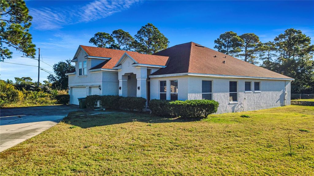 Photo of 685 Malaga Avenue, Deltona, FL 32725 (MLS # S5140535)