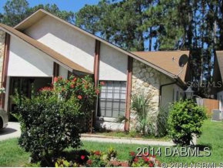 Priced for quick sale- Excellent value for this 2 bedroom- (POSSIBLE 3 BEDROOM) 2 bath attached home with garage!. This home features a very nice open kitchen, a spacious family room and a huge walk-in closet in the master bedroom. Enjoy time on the enclosed rear porch. Walking distance to the clubhouse and pool. What a great tree lined subdivision in the heart of Port Orange close to shopping and schools. Hurry, these never last long! All information recorded in the MLS is intended to be accurate but cannot be guaranteed. ;Water: City