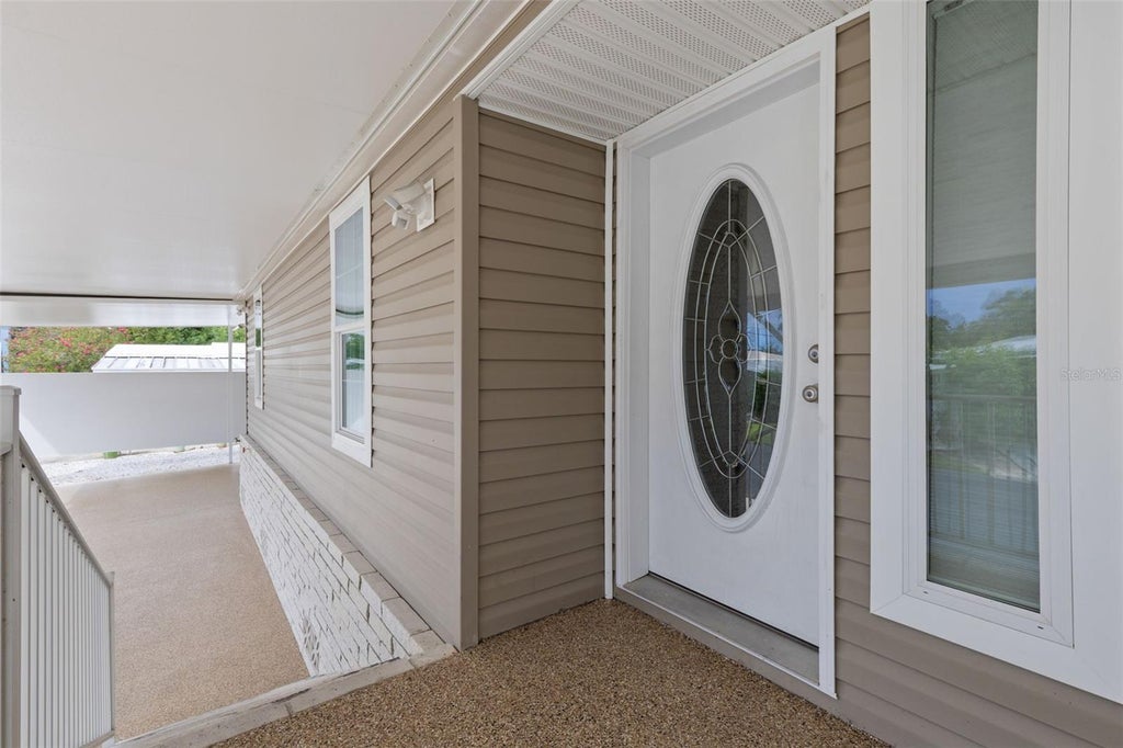 Photo of 7300 Americana Drive NE #143, St Petersburg, FL 33702 (MLS # TB8553983)