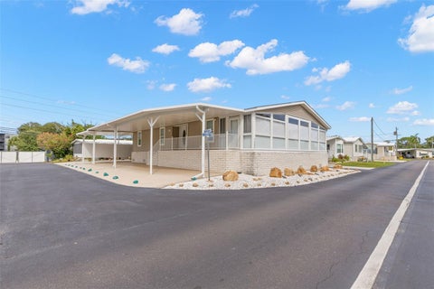 Photo of 7300 Americana Drive NE #143, St Petersburg, FL 33702 (MLS # TB8553983)