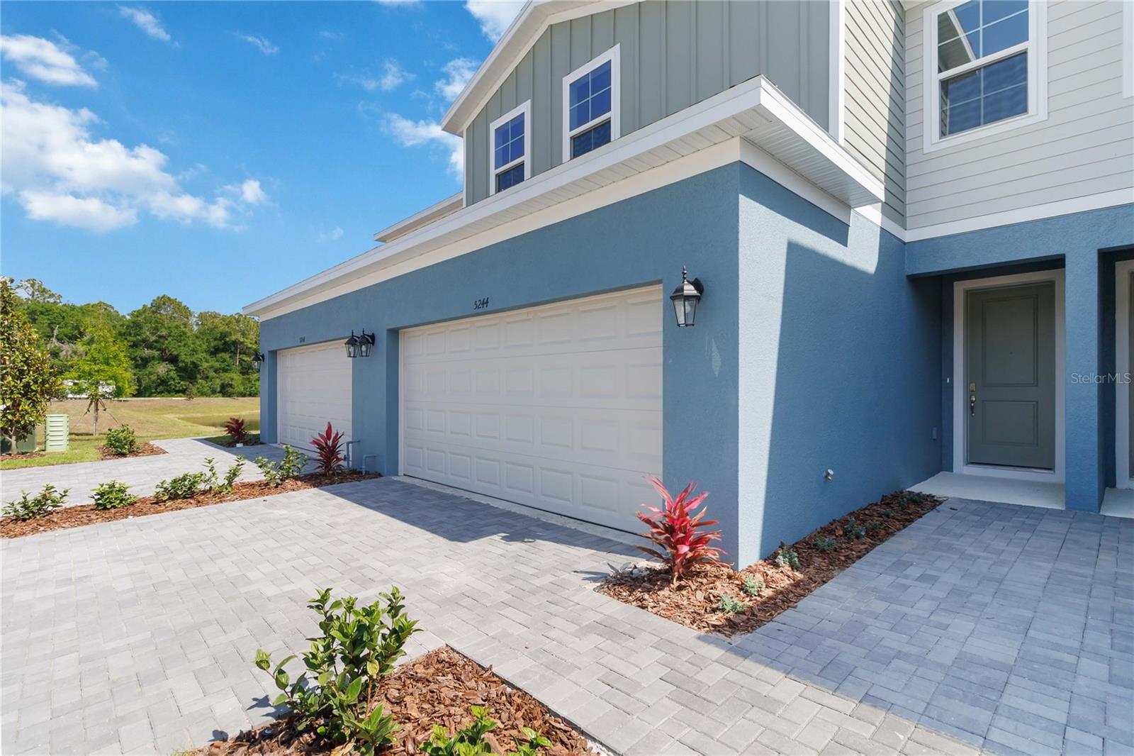 Welcome to Terra Haven in St. Cloud—Just Minutes from Lake Nona Without the Premium Price! Discover the Hazel floor plan, a beautifully designed 4-bedroom, 2.5-bathroom townhome offering 1,860 sq ft of thoughtfully crafted living space in a low-maintenance community with NO CDD fees. Enjoy a 2-car garage, an inviting covered lanai, and an open-concept main floor with 9'4" ceilings and 17x17 ceramic tile flooring throughout. The modern kitchen is the heart of the home, featuring 42" painted linen cabinets, quartz countertops, under-cabinet lighting, and a spacious island perfect for casual dining or entertaining. Upstairs, four generously sized bedrooms include a private primary suite designed for rest and relaxation. Fencing is permitted, and with HOA-included lawn care and irrigation, you’ll enjoy a truly low-maintenance lifestyle. Perfectly located near Medical City, Orlando International Airport, top-rated schools, and major highways including SR 417, this home offers easy access to Downtown Orlando, theme parks, shopping, and dining—all from one of Central Florida’s fastest-growing areas. DISCLAIMER: Photos and/or drawings of homes may show upgraded landscaping, elevations and optional features that may not represent the lowest priced homes in the community. Pricing, Incentives and Promotions are subject to change at anytime. Promotions cannot be combined with any other offer. Ask the Sales and Marketing Representative for details on promotions.