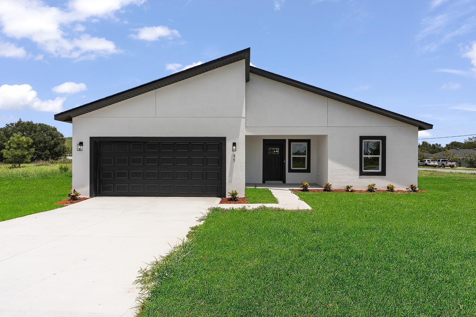 1865 sqftI4 Beds|3 Baths - Move-in ready and investor-friendly! This modern home features luxury vinyl flooring throughout, white cabinetry, and sleek, stylish finishes. With 4 bedrooms and 3 bathrooms, it offers a smart layout perfect for comfortable living.The primary bedroom features his-and-hers walk-in closets and a luxurious soaking tub, creating a true retreat within the home.Located in a fast-growing area of Ocala, this property is a great investment opportunity with strong potential for appreciation.Bonus: The adjacent lot is also available for sale! Submit your offer to purchase both the home and the lot – perfect for investors or buyers looking for extra space.Don't miss out!