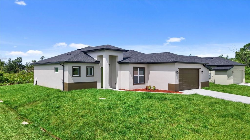 Photo of 13639 Begonia Circle, Port Charlotte, FL 33981 (MLS # O6333389)
