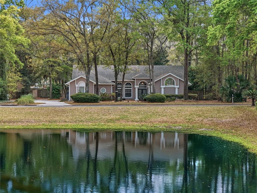 Located in the highly sought-after Huntington neighborhood, this 2,760 sq ft home sits on just under half an acre directly across from the community pond, offering a setting that combines space, privacy, and convenience in one of the area’s most desirable communities.

Inside, the home immediately opens up with soaring ceilings that carry through the main living areas and into the primary suite, creating a sense of volume that’s hard to find. The layout is built around a large, open-concept kitchen and living space that truly functions as the heart of the home.

The kitchen stands out with its size, layout, and functionality. Featuring extensive counter space, a large center island, breakfast bar seating, and abundant cabinetry, it is designed for both everyday use and entertaining. It opens directly to the main living area, allowing for easy flow and connection throughout the home.

The living room is a standout space, anchored by a custom built-in wall with fireplace and shelving, and framed by a full wall of windows that bring in natural light and views of the pool and backyard. The ceiling height combined with the openness of the space makes it feel expansive without losing comfort, and the layout offers multiple options for furniture placement and gathering.

The primary suite continues the theme of scale and separation, featuring its own fireplace, a custom feature wall, and a spacious bathroom with soaking tub, walk-in shower, and generous layout. It feels like a true retreat within the home.

Step outside and the property really starts to separate itself. The screened-in pool, recently resurfaced, anchors the backyard and is complemented by a covered patio with a built-in wet bar, an extended paver patio, and a dedicated firepit area. Mature trees line the rear property line and create a high level of privacy.

The property also offers practical advantages, including an extended driveway with ample parking, a large two-car garage with extended ceiling height, and a side yard with a double gate for hidden boat or trailer parking.

Major updates have already been completed, including a new roof in 2018, pool heater in 2019, updated kitchen appliances with a newer dishwasher in 2022 and oven in 2026, pool resurfacing in 2024, and both the pool pump and one HVAC unit replaced in 2025.

A well-rounded property that delivers on space, layout, and indoor-outdoor living in a neighborhood where homes consistently move quickly.