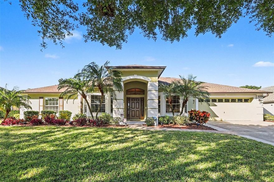 Welcome to Estates of Auburndale, a lovely gated community! Enjoy quick access to I-4, downtown Auburndale, and LEGOLAND, with convenient routes to Tampa and Orlando. The area is surrounded by newer developments and abundant lakes ideal for fishing and boating.This 4-bedroom, 3 full-bath home features a desirable three-way split floor plan. The expansive primary suite is privately situated on its own side of the home and includes a large walk-in closet and a luxurious en-suite bath with a custom-built vanity with granite countertops, glass-enclosed shower, garden tub, and water closet.On the opposite side of the home are two bedrooms and a full bath, separated by a hallway with a pocket door for added privacy. A fourth bedroom and full bath are located toward the rear of the home, offering access to a 10x22 bonus room—perfect for guests, multigenerational living, or flexible use.The screened 29x20 paver patio is ideal for entertaining and outdoor gatherings and provides ample space to add a pool. The kitchen was remodeled five years ago and showcases high-end solid wood custom cabinetry with pull-out shelving, granite countertops, a large breakfast bar, and a comfortable dinette area. All stainless-steel appliances convey, including a new refrigerator.Additional highlights include a den with double French doors, brand-new Andersen hurricane-impact windows throughout, custom blinds, a fully fenced yard, new gutters, water softener, and a newer roof and AC system, making this home truly move-in ready and low maintenance. The home also features comfort-height toilets in the primary bath and one secondary bedroom bath, a Jacuzzi spa, garden shed, and an ADT alarm system.For added convenience, the EGO electric lawn mower, edger, and trimmer with batteries and charging stations convey.This well-maintained community offers 24-hour video surveillance, two community pools, a playground,