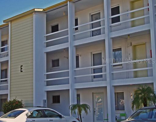 Charming STUDIO-size condo on desirable 3rd floor (higher ceilings, no one overhead). Hate to spend another winter in snow/ice? Now is the time to get your place in the sun with this AFFORDABLE cutie. Low monthly HOA & taxes make owning it far more appealing than renting. Come check out this active, busy, 55+ community & its heated pool, clubhouse, large coin laundry, even picnic tables for cookouts! Great location...only a block to Bayshore Gardens Shopping Center (Target, brand new Publix, TJMaxx, BofA, Chick-fil-A, etc). Bus stop at end of street and plenty of nearby places to eat & enjoy. Public library is near the other shopping center several blocks away. Now is the time to buy before snowbirds return to scoop up a great deal like this one!